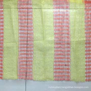 Orange and yellow netting for road construction